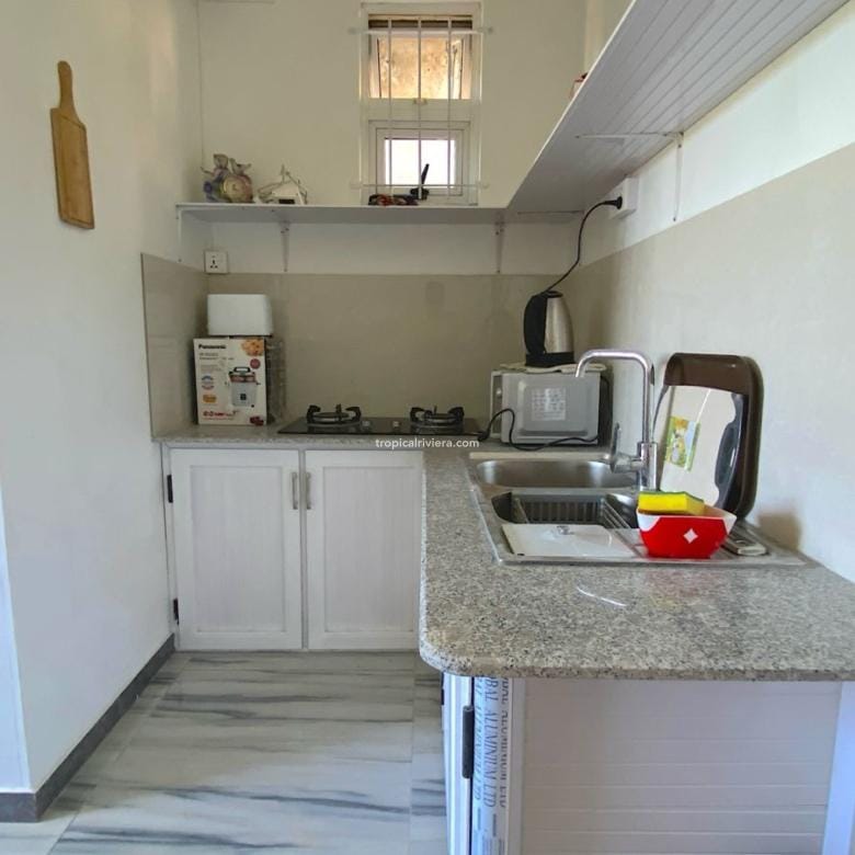 Rental – One Bedroom Furnished Apartment with shared pool – Calodyne