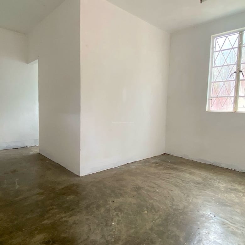 Rental – Polyvalent Building with Large Gated Yard in Rose Hill Centre